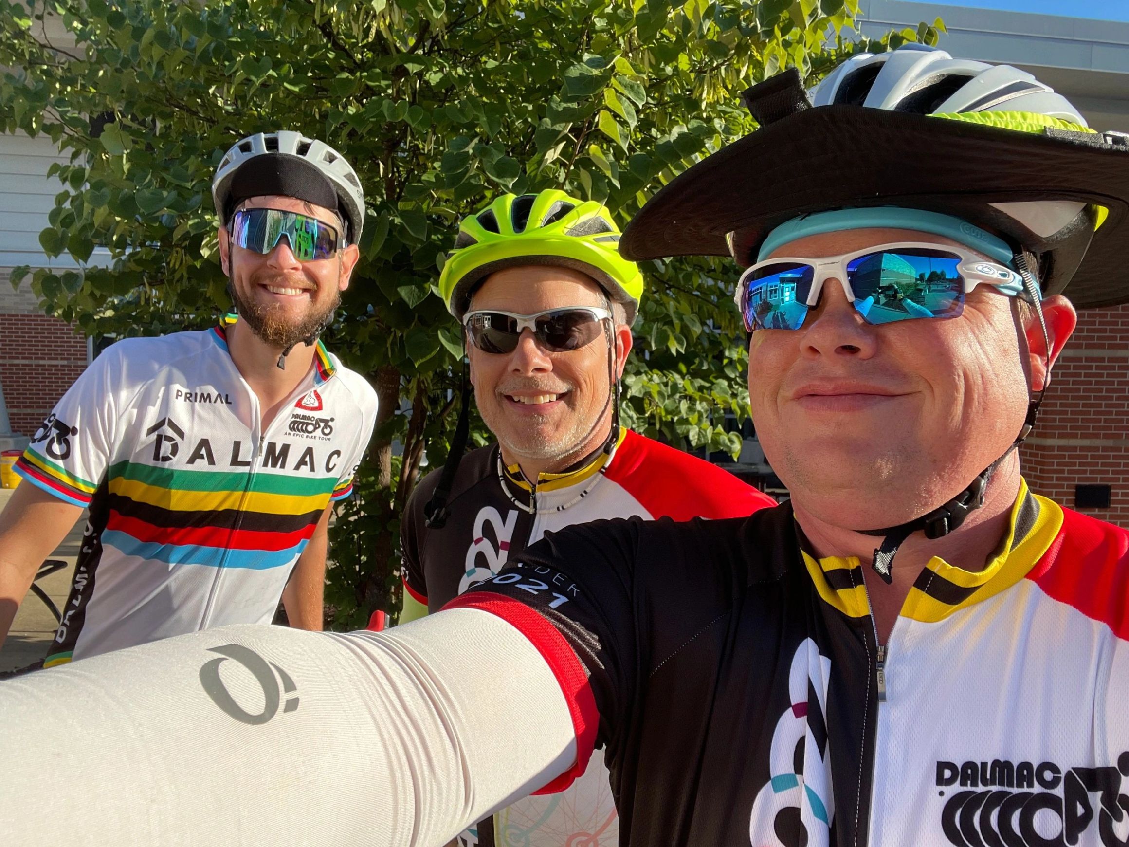 Three riders in DALMAC jerseys before the ride